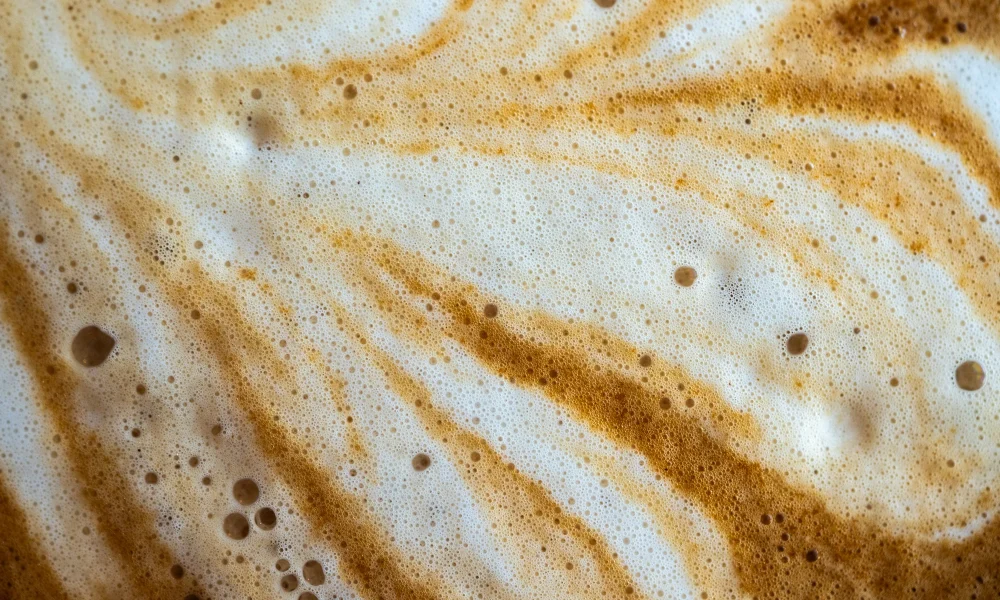 Full-frame-shot-of-the-surface-of-hot-latte-coffee